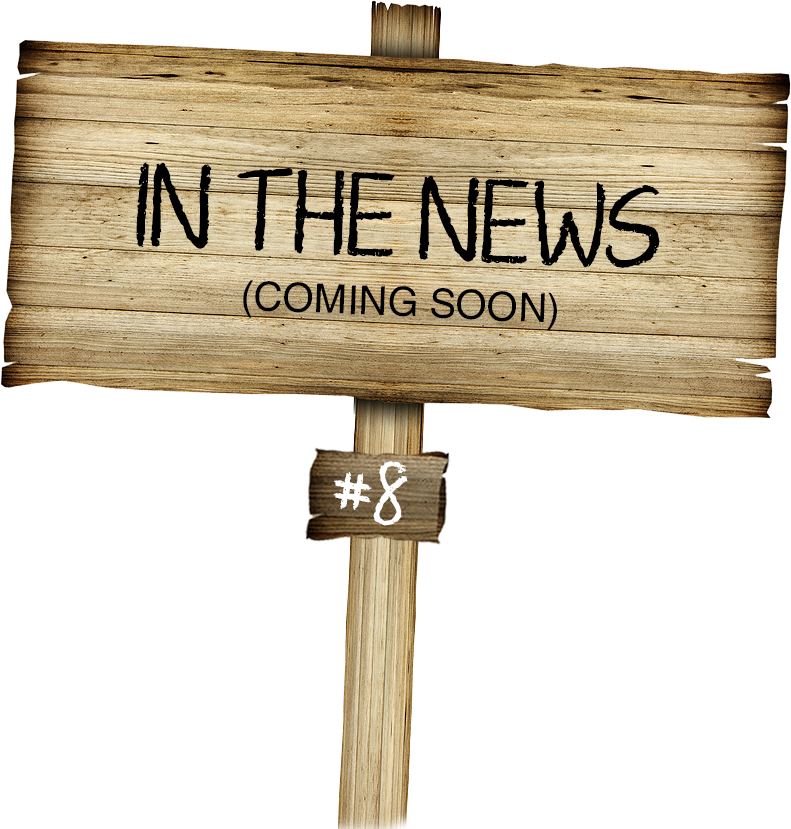 Wooden sign with In the News written on it